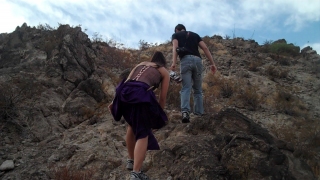 You're Gone Behind the Scnes - Tania and Krisstian climbing up a mountain